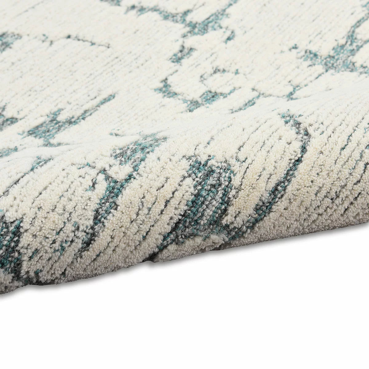 Calvin Klein Sculptural Teal Rug in 2 Sizes